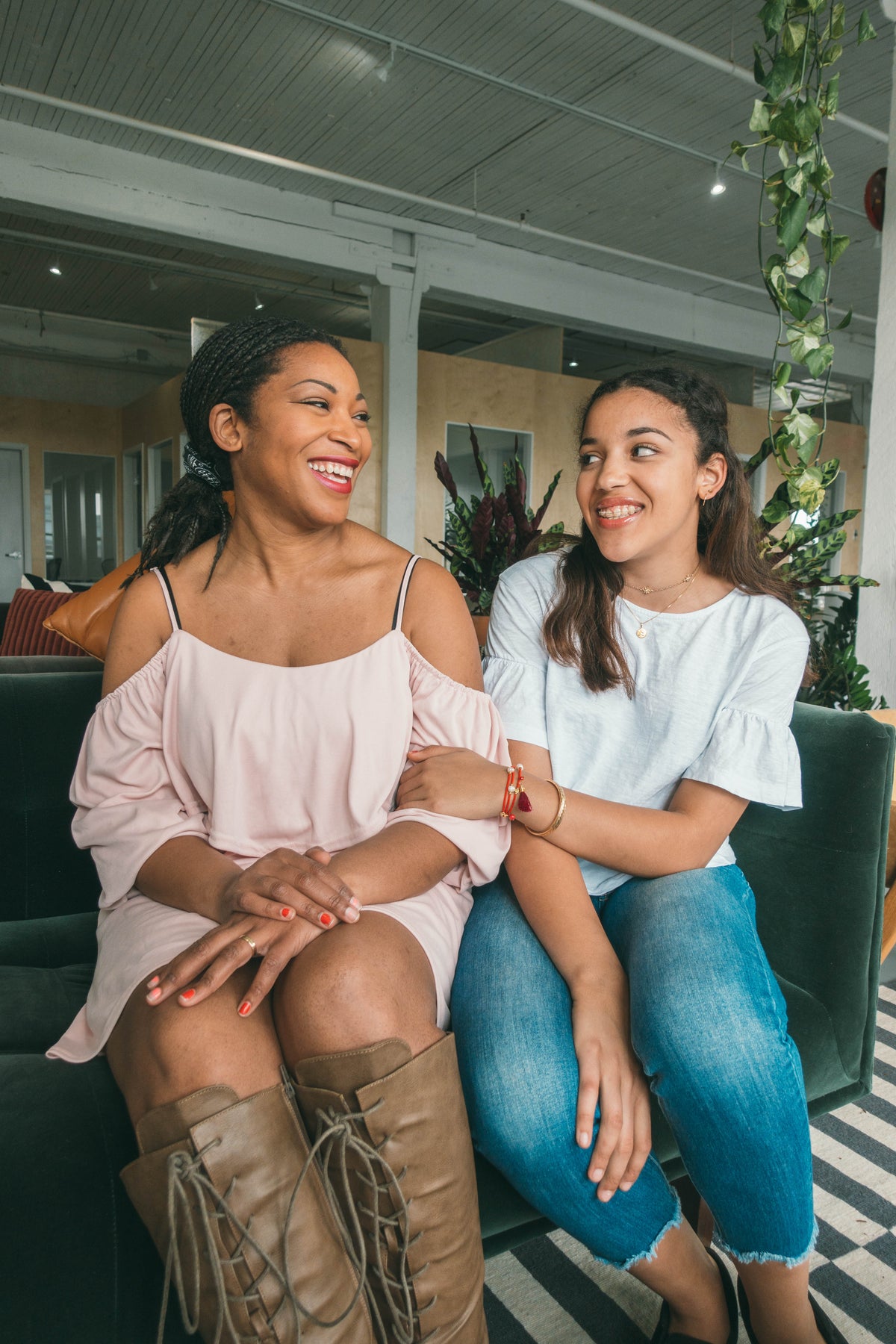 Mother and Daughter Smiling and Each Other