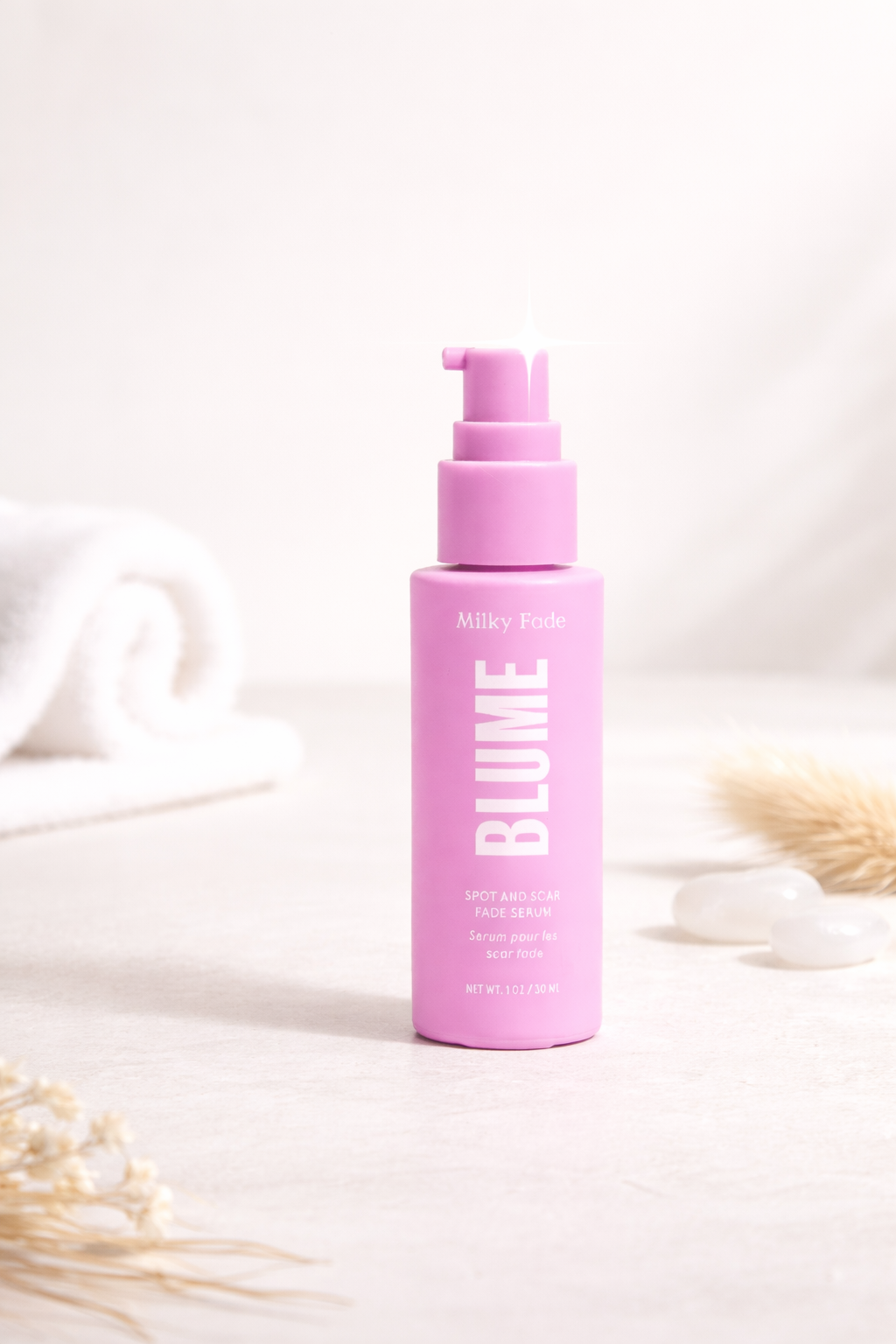 Blume Milky Fade Spot and Scar Fade Serum in pink bottle, a gentle serum designed to fade dark spots, acne scars, and hyperpigmentation
