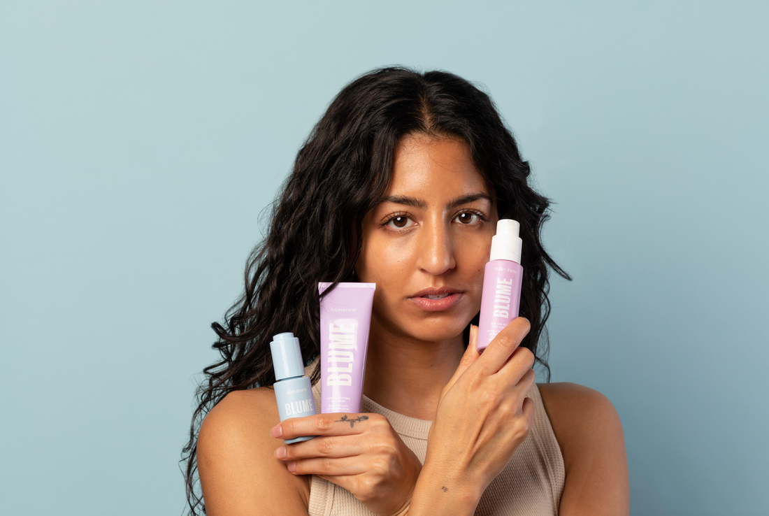 Blume skincare products including Milky Fade serum, Superpower mask, and Meltdown oil held by woman with glowing skin