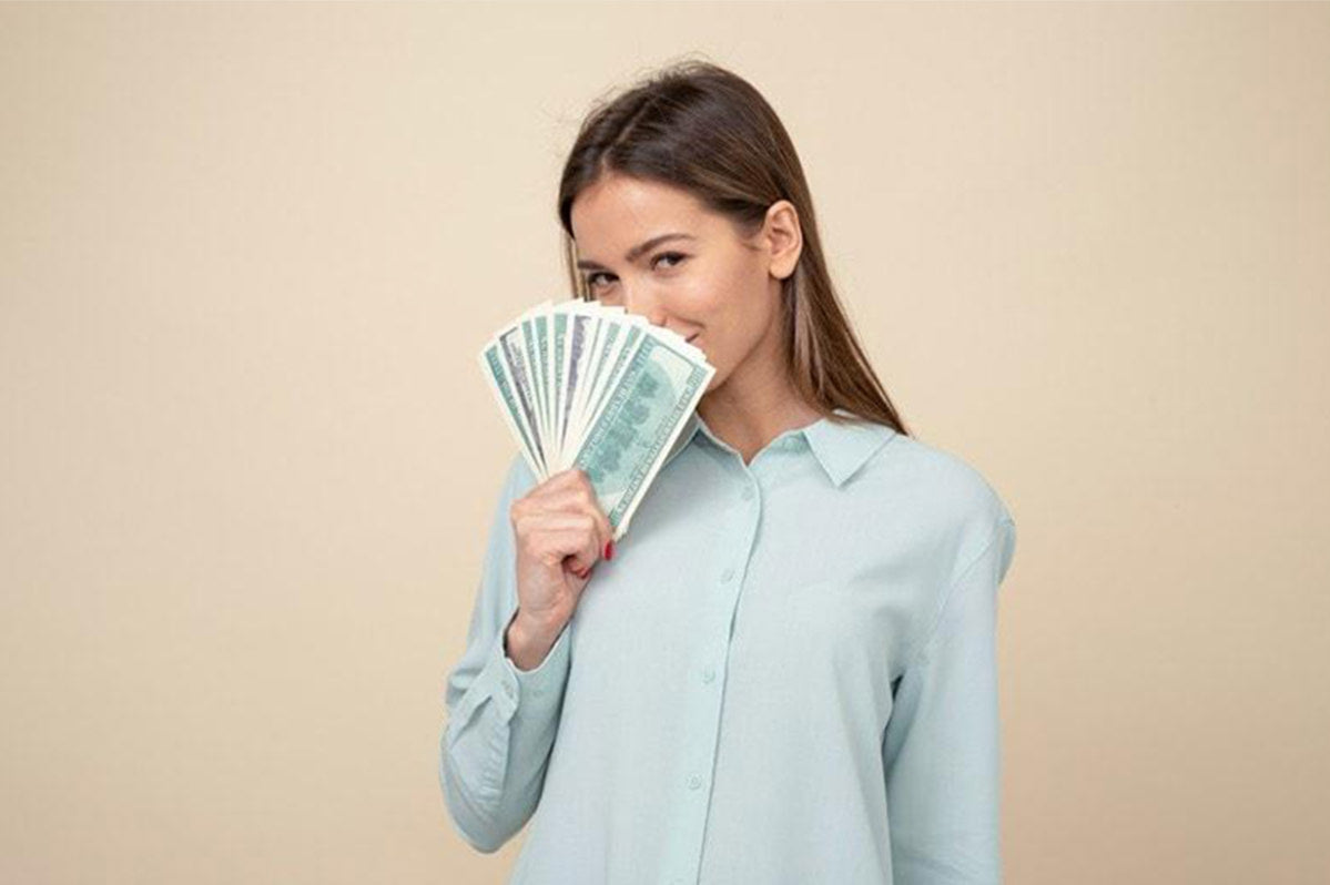 Woman Holding Cash Happy
